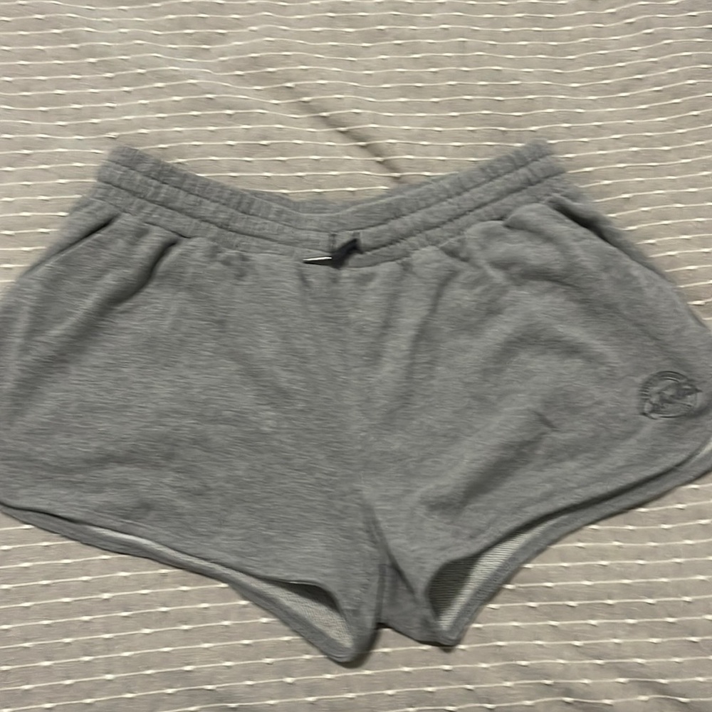 Grey cabelas shorts with pockets.